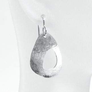 Linen-textured domed pierced egg-shaped earrings handmade by MetalSmitten.com