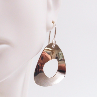 Handmade sterling silver pierced egg-shaped earrings by MetalSmitten.com